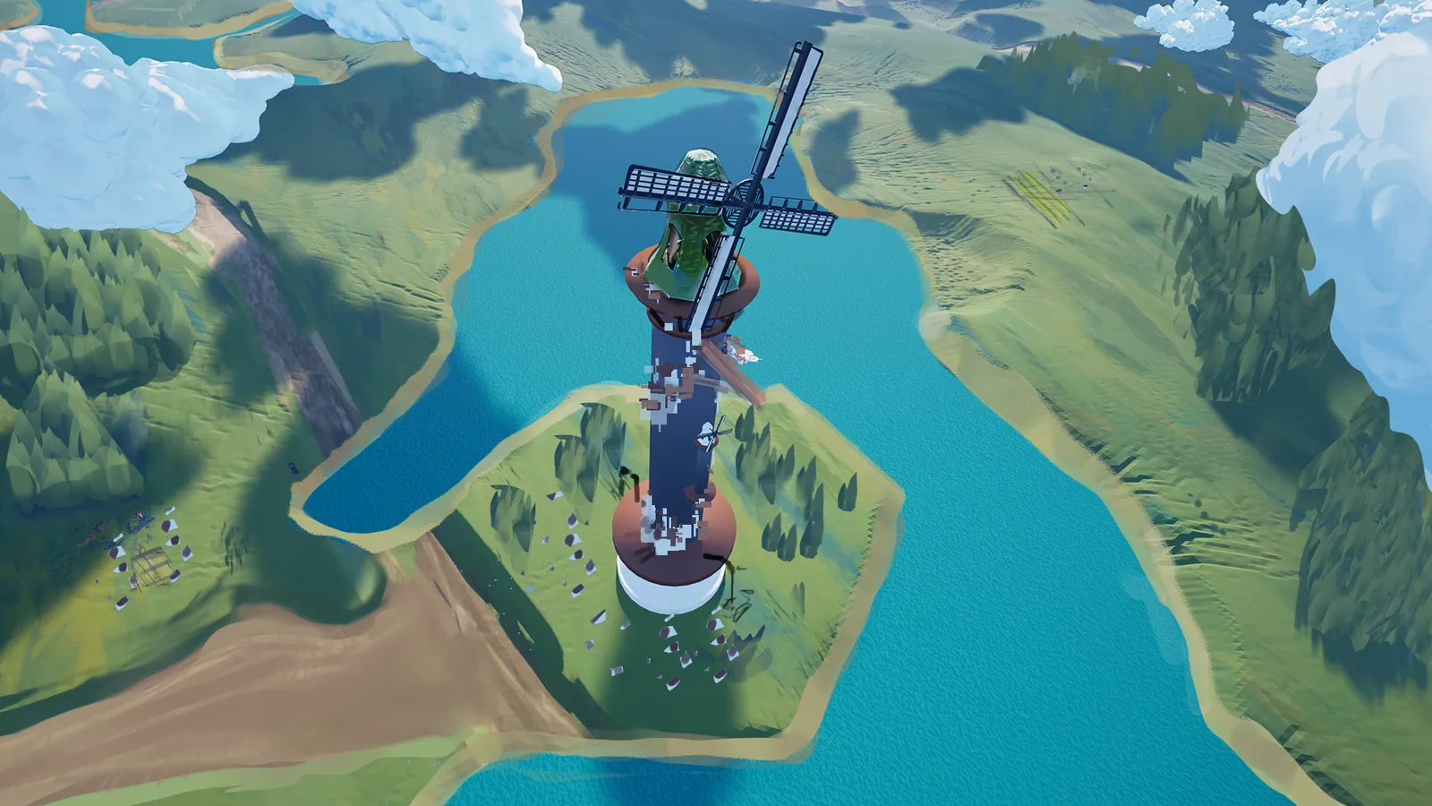 The camera high above the Belfry, a windmill-topped tower on an island in a turquoise lake.